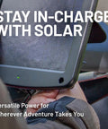 Person holding Five Watt Solar Panel 12V Battery Charger with Charge Controller IP67 weatherproof for motorcycles and cars.