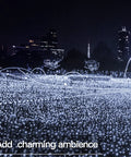 66Ft 200 LED Outdoor String Lights With Battery Pack And Remote Waterproof Fairy Lights lit in urban park