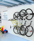 Swivel Bike Storage Rack For Tight Spaces with 130 Degree Swivel, four bikes mounted in a garage on an adjustable wall system.