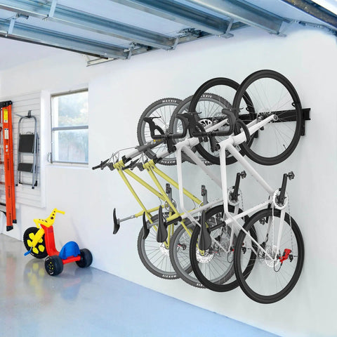 Swivel Bike Storage Rack For Tight Spaces with 130 Degree Swivel, four bikes mounted in a garage on an adjustable wall system.