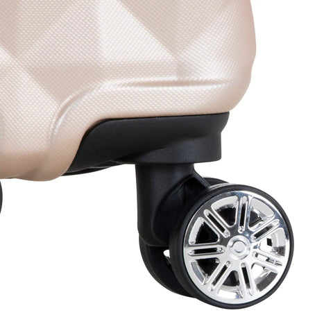 Close-up of wheel on Diamond Tower Hardside Luggage With Expandable Design Rose Gold Finish Eight Wheel Spinner Travel Case