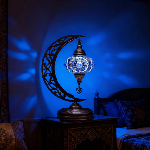 Dope Moon Shaped Mosaic Table Lamp With Turkish Glass Handmade Moroccan Boho Vintage Stained Glass Desk Lamp Tiffany Style Nightstand Lamp US Plug And E12 Socket Unique Artisan Lighting Decor emitting blue light on nightstand