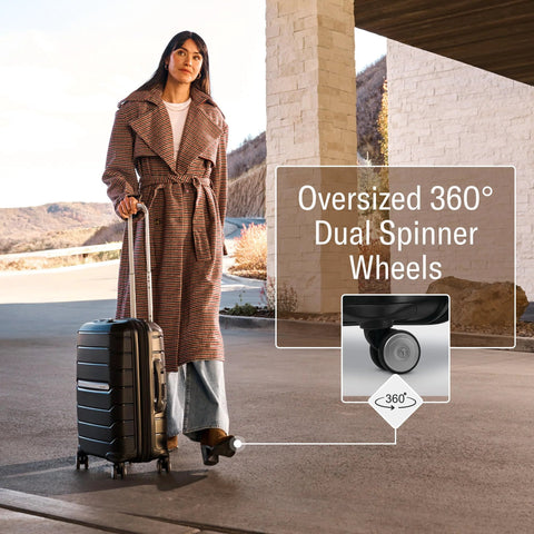 Traveler with Samsonite hard shell carry-on luggage featuring oversized 360-degree dual spinner wheels for easy maneuverability.