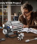Man assembling V8 Engine Model Kit With Electric Motor And Battery Box 535 Piece DIY STEM Mechanics Engineering Set