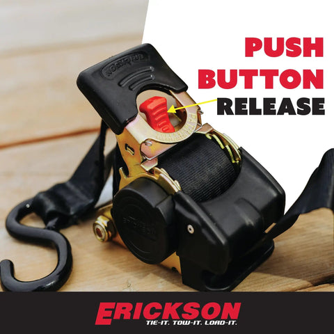 Close-up of 2 Inch By 10 Foot Black Retractable Ratchet Tie Down Straps with auto retract and one button release, 3300 lb load