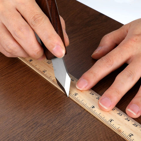 Dual Beveled Wood Marking Knife With Bombproof Beech Handle And Hella Sharp Vanadium Steel Core Top Shelf Scribing Gauge cutting a ruler.