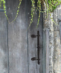 Rustic Cast Iron Outdoor Gate Handle With Knob Pulls For Garden Fence And Cabinet Hardware on a wooden garden gate