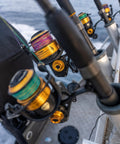 Spinfisher VII 3500 saltwater spinning reels on rods, IPX5 seal, aluminum spools visible, offshore fishing setup.