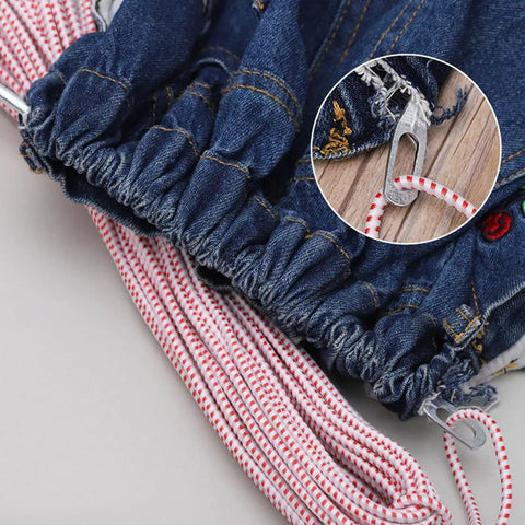 Fast And Easy No Fuss Drawstring Threader Tool For Jackets Pants Shorts And Hoodies, shown threading through denim drawstring.