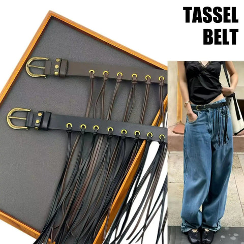 Vintage Industrial Waist Belt Featuring Heavy Copper Hardware And Flowing Tassels With Easy Adjustable Strap In Warm Coffee Brown For Daily Wear That Gives Serious Drip worn with loose jeans and contrasting black top.