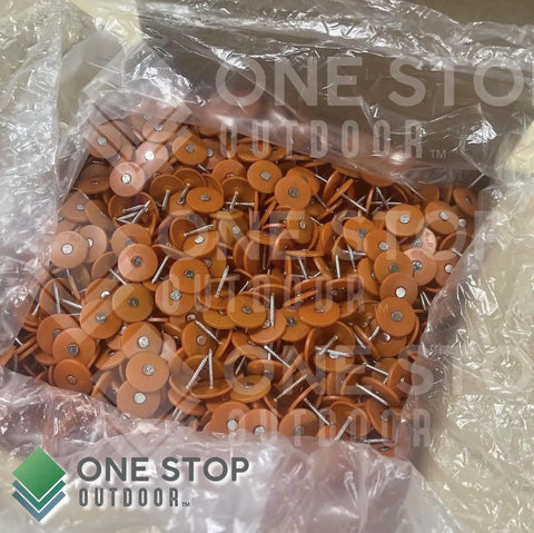 Top Shelf 500 Pack Of Heavy Duty One Inch Galvanized Roofing Nails With Round Plastic Caps For Tar Paper House Wrap Foam Board And Insulation Film Totally Dope And Built Tough in a clear plastic bag.