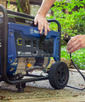 6600 Peak Watt Portable Generator With Transfer Switch Ready 30A RV Receptacle being connected outdoors