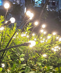 4 Pack Solar Fairy Lights Outdoor Waterproof Garden Decor With 40 LEDs, flexible iron wire in garden at night