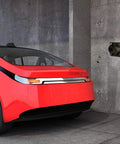 Heavy Duty EV Charger Nozzle Holster Dock For J1772 EV Coupler Connector Wall Mount in a garage with red car nearby