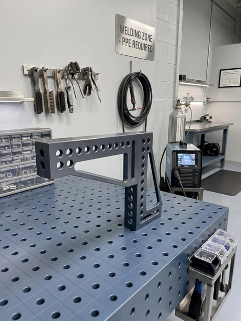 Built Tough 12 Inch Welding Clamping Square And Table Extension Kit with precision machined riser blocks on a welding table.
