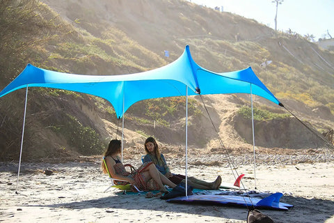 Two Extra Poles For Grande Neso Tent Replacement Kit setup with shade on beach, five section 7 foot aluminum poles, foam top ball visible