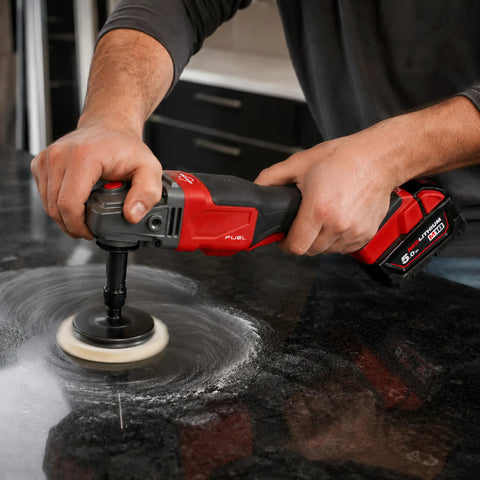 Person using 5/8-11 Angle Grinder Extension Shaft Adapter Kit turns any grinder into a drill for polishing surface