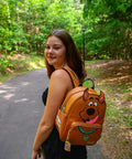 Snag This Totally Rad Scooby Doo Big Face Mini Backpack Purse Crafted From Premium Faux Leather shown on model outdoors.