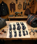 6 Pack Black Zipper Sliders Pullers Repair Kit for coats, jackets, and luggage on wooden table with sewing tools.