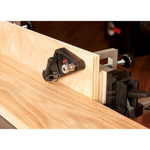 Kickass Flex Stock Guide For Portable Table Saw Featuring Slick Rollers and Fast Height Setup positioned on wood for precise cuts.