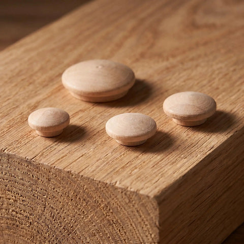 Mushroom Head Wood Plugs For Screw Holes Unfinished Button Caps on wood surface showcasing various sizes