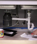 Applying Liquid Rubber Coating Sealant under sink for waterproof flexible UV resistant protection, DIY-friendly 32 oz