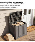 Outdoor Storage Box 31 Gallon Waterproof Resin Deck Box For Backyard Patio Cushions Gardening Tools And Gear Indoor Outdoor Use Lockable UV Resistant Weatherproof Durable Grey by a door with packages inside