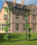 Metal Garden Arbor For Climbing Plants And Pergola Decor Built Tough Carbon Steel Frame with plants on lawn in front of house