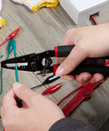 Person using 7 Inch Pro Grade Wire Stripper And Cutter For 10-20 AWG Solid And 0.8-2.6mm Stranded Wire on green wire