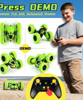 Boy playing with 4WD Remote Control Car with 360 Degree Flips, Dual Sided Driving, Durable Stunt RC Vehicle with Breathing Soft Lights