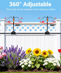 100Ft 360 Degree Adjustable Garden Irrigation System installed on a fence, watering flowers with mist from 18 nozzles.