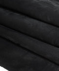 Side view of four black suede headliner fabric rolls with foam backing (96×60 in)
