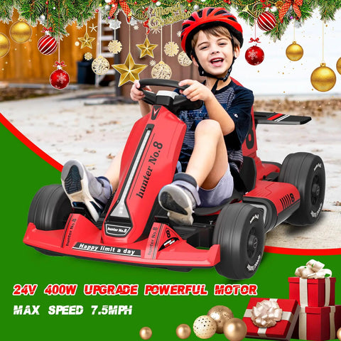 Child smiling in a 24V Electric Go Kart With Adjustable Seat For Kids And Teens, 7Ah Battery, Top Speed 7.5 MPH, wearing helmet, Christmas theme