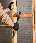 IsoCore Wrecking Bar 18 Inch Board Bender And Crowbar With Shock Absorbing Handle in use for prying wooden beams on construction site
