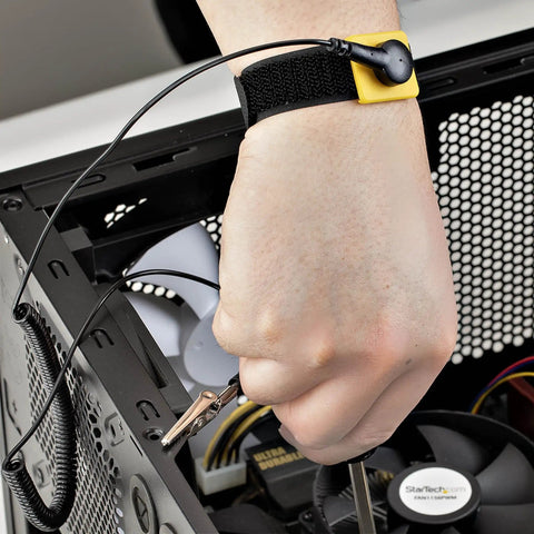 Person using ESD Wrist Strap With Grounding Cable And Detachable 5ft Cord For Safe Static Discharge Reducing Shock Risk