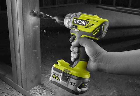 High Output 18V Cordless Drill Driver With 22 Torque Settings And Self Tightening Chuck being used to drill into wood.