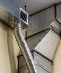 Two Roll Gray Duct Insulation Wrap With Thermal Foil Backing For HVAC Vents And Air Ducts 12 Inch Wide 20 Feet Long on ductwork.
