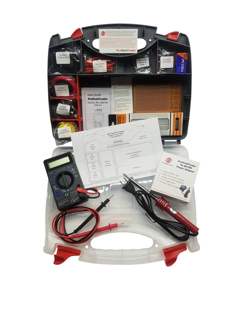 Open case of Deluxe Electronics Third Edition Component Kit For Beginners To Pros, showing multimeter, wires, and manuals.