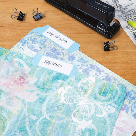 Floral Fun File Folders Bulk Pack Of 24 With Six Decorative Designs on desk with stapler and clips