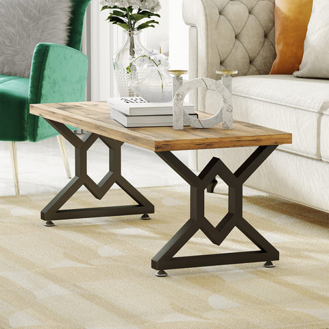 Beefy 28 Inch Metal Table Legs Set of 2 Cast Iron Square Tube X Shaped Dining and Desk Supports Black Powder Coat Finish Industrial Modern Style Rust Resistant Each Leg Handles Up to 800 Pounds supporting a wooden table top in a living room setting.
