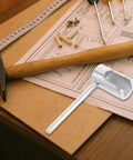 Heavy Duty Steel Fire Sprinkler Wrench Spanner for Concealed And Semi Recessed Heads on a work desk with tools and plans.