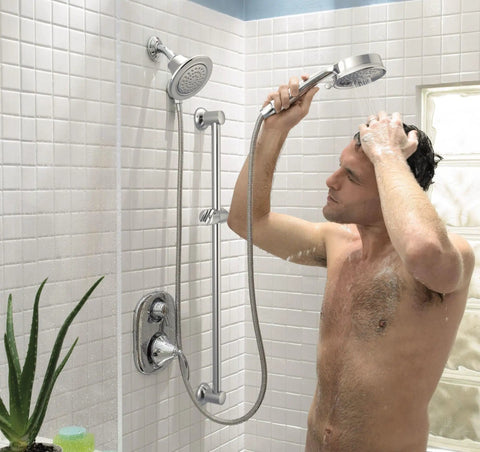 Man using Icon Chrome One-Function Showerhead With Five Seven Eighths Inch Diameter Full Spray, 2.5 GPM, Easy Install, Model S6312