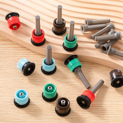 Heavy Duty Replacement Sprinkler Heads 60 Pack features assorted colored heads with adjustable nozzles for lawn irrigation.