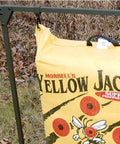 Bag Target Stand for Indoor and Outdoor Archery Practice with Yellow Jacket bag on grass background