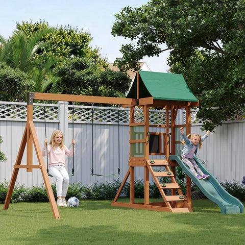 Children playing on Tough As Nails Wood Backyard Swing Set With Wave Slide, Rock Wall, Belt Swings, Play Deck, Chalkboard, And Canopy Roof.