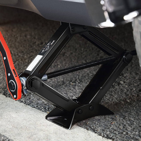 2 Ton Car Scissor Jack With Labor Saving Ratchet Wrench lifting a vehicle, adjustable lift from 3.85 to 17.4 inches, in use.