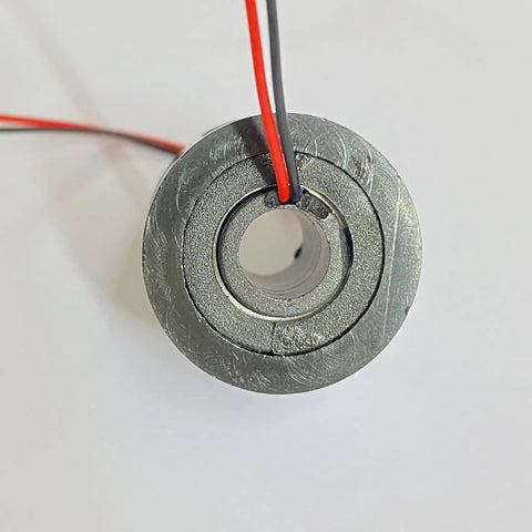Hollow Slip Ring For Electric Motors Power And Signal Transfer With 2 4 6 12 Channel Paths, Rotating Connector, 2 Wire 1.5A, Inner Hole 7mm Outer Diameter 22mm, Gold Contact Points For Smooth, Low Torque Operation, Industrial Grade And Ready To Roll. front view with red and gray wires