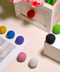 Colorful jute rope knobs arranged on a surface, featuring 6 Pack Jute Rope Cabinet Knobs Set 1.26 Inch Round Wood Knobs For Kitchen Cabinets