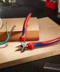 Comfort Grip Diagonal Cutters 160 mm with Ergonomic Handles on a workbench, showing color coded comfort system and tether ready setup.