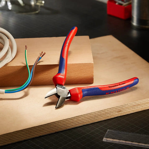 Comfort Grip Diagonal Cutters 160 mm with Ergonomic Handles on a workbench, showing color coded comfort system and tether ready setup.